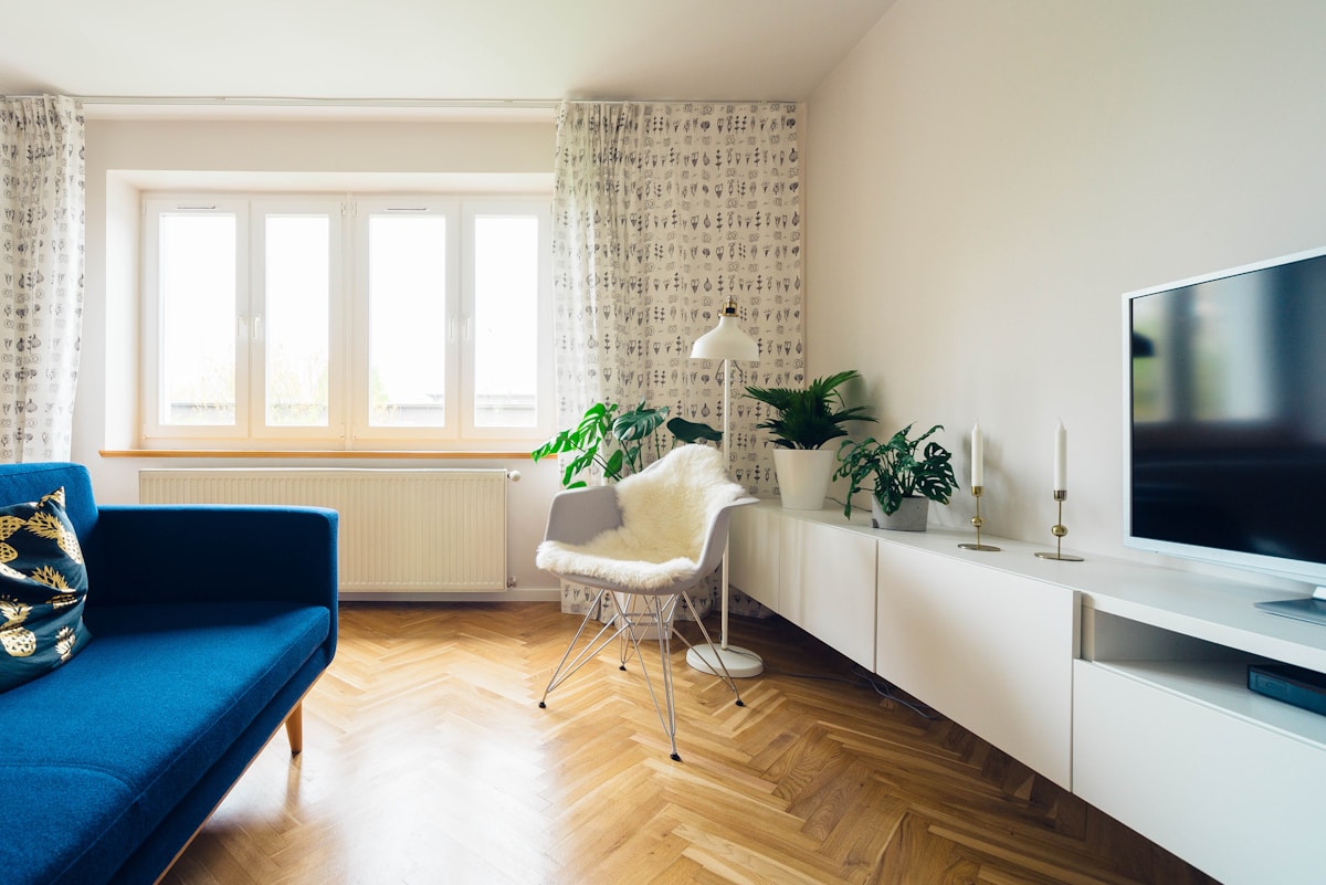 Comfortable bedroom with natural light — SamplePkg: Harbor View — 2BR corner unit